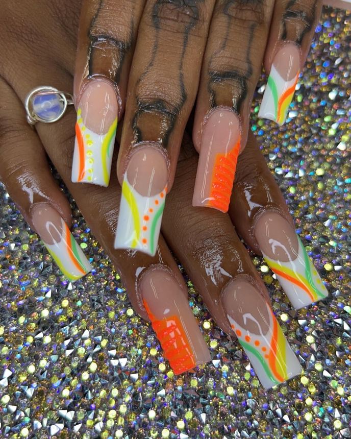 Custom freestyle acrylic set on a holographic backdrop