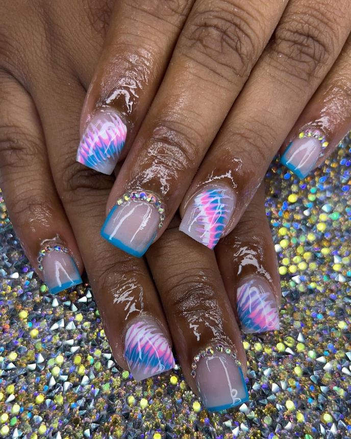 Recreated inspiration acrylic set on a holographic backdrop