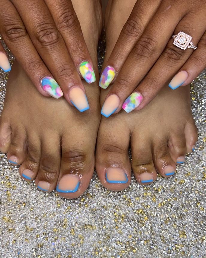 Acrylic pedicure on a holographic backdrop