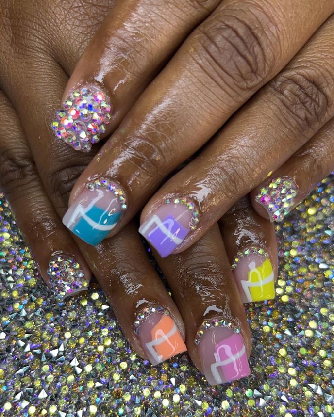 Custom freestyle acrylic set on a holographic backdrop