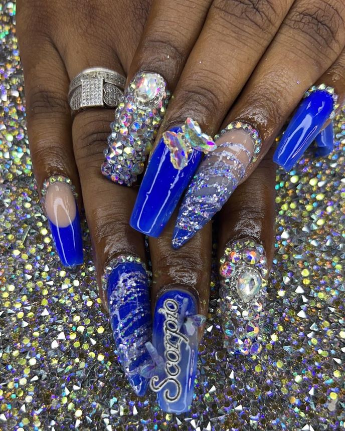 Custom freestyle acrylic set on a holographic backdrop