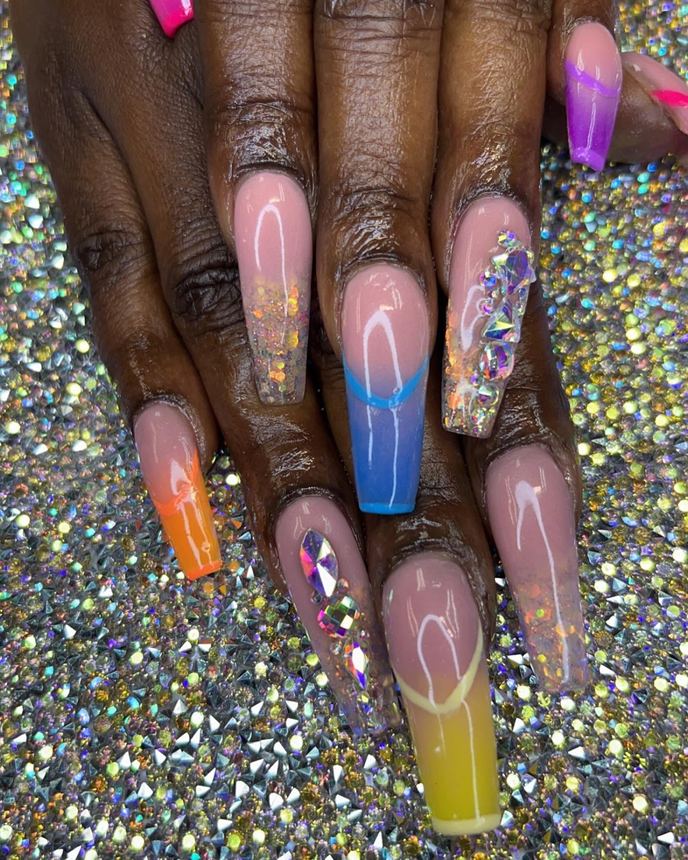 French tip acrylic set on a holographic backdrop