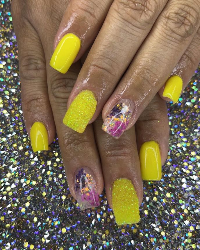Custom freestyle acrylic set on a holographic backdrop