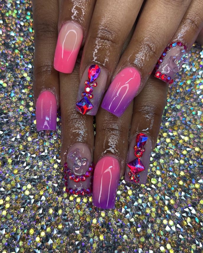 Custom freestyle acrylic set on a holographic backdrop