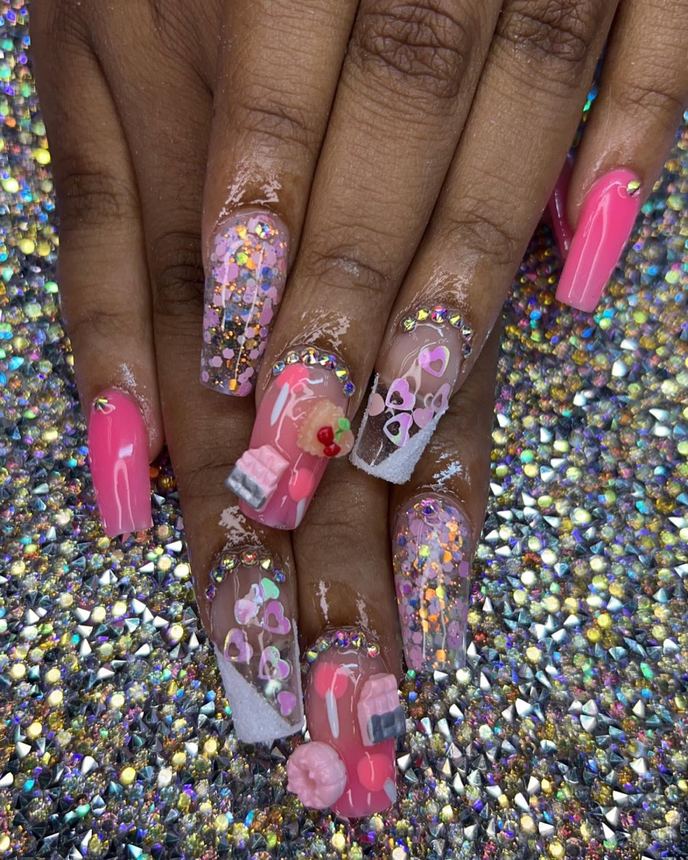 Custom freestyle acrylic set on a holographic backdrop