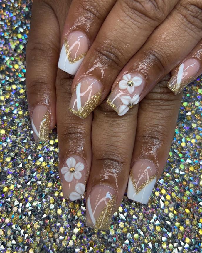 Hand-painted acrylic nail art on a holographic backdrop