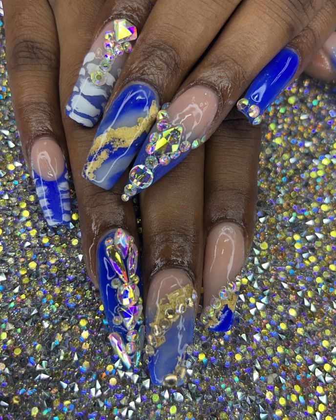 Custom freestyle acrylic set on a holographic backdrop
