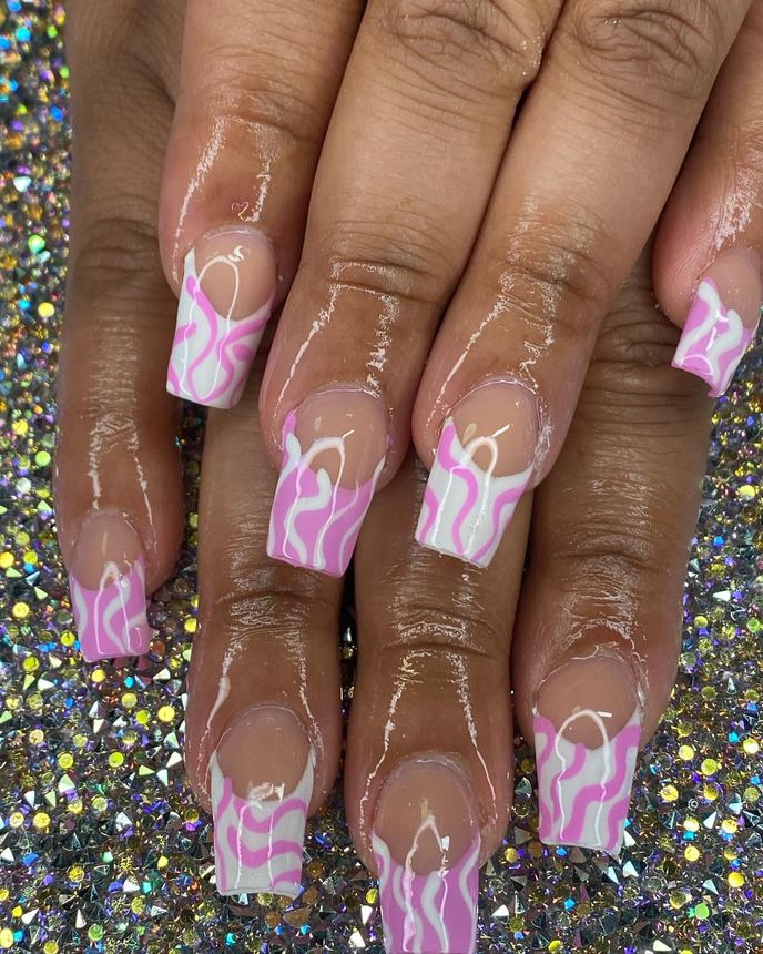 Hand-painted acrylic nail art on a holographic backdrop