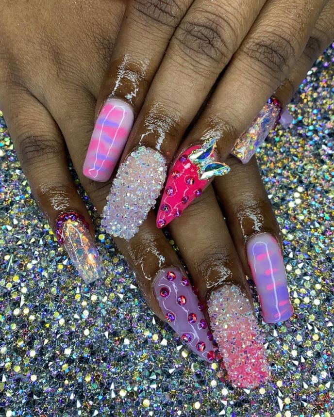 Recreated inspiration acrylic set on a holographic backdrop