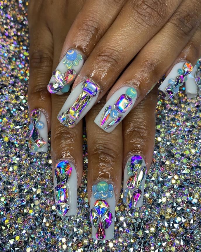 Custom freestyle acrylic set on a holographic backdrop