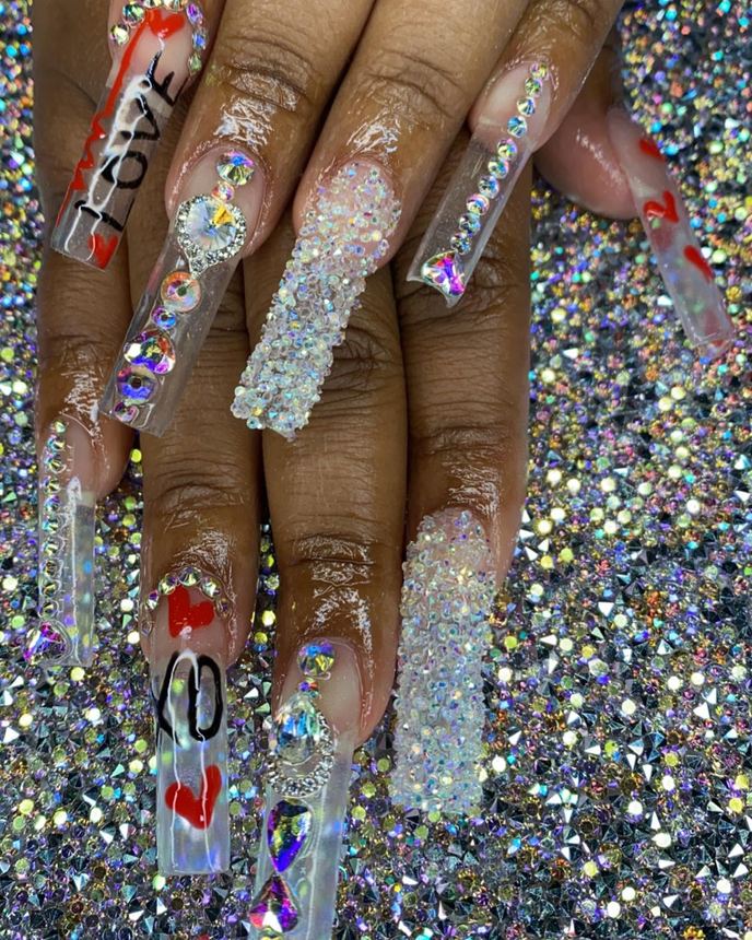 Custom freestyle acrylic set on a holographic backdrop