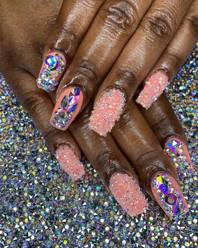 Custom freestyle acrylic set on a holographic backdrop