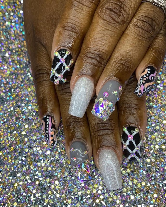 Custom freestyle acrylic set on a holographic backdrop
