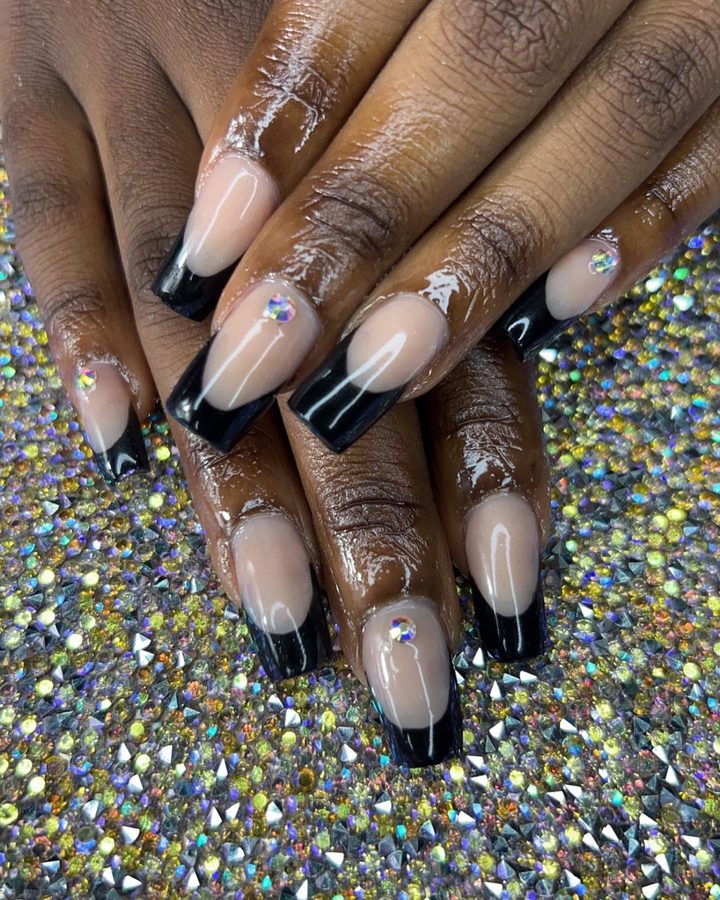 Black French tips with rhinestone accents
